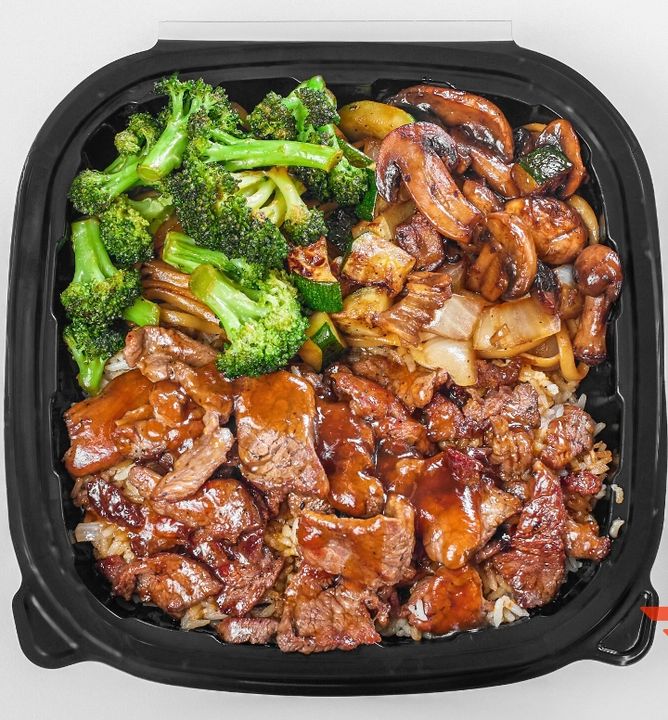 Steak hibachi box with fried rice and grilled vegetables